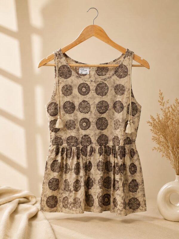 Sleeveless beige and brown peplum style short kurta